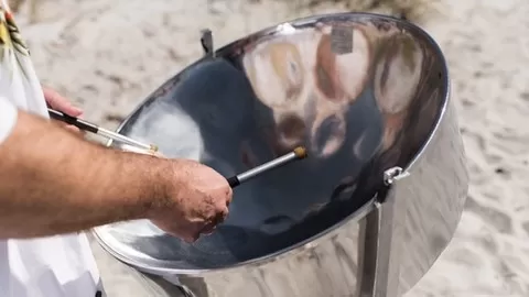 Make beautiful music on the Steel Drum (or an app on your cell phone). Learn to play beautiful music on a steel drum!